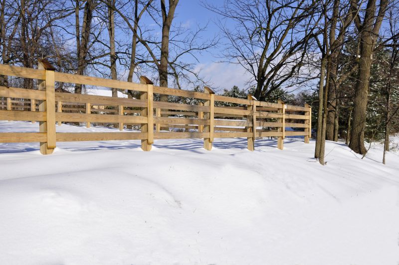 Farm Fencing in Snowy Fields